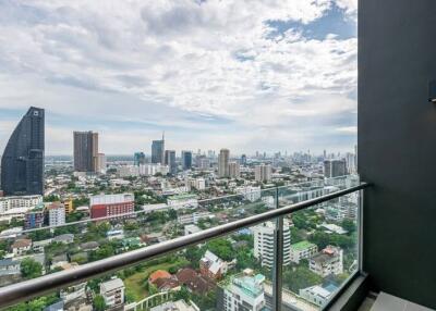 A balcony with a city view.