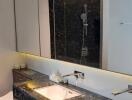 Modern bathroom with marble counter and large mirror