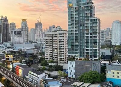 Aerial view of buildings at sunset