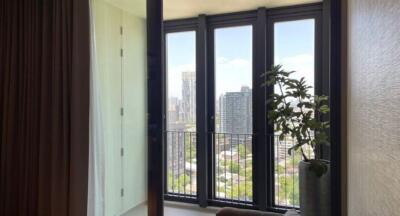 Living room with large windows and city view