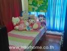 children's bedroom with toys and cartoon-themed decoration