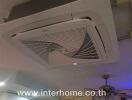 Ceiling with air conditioning unit and fan