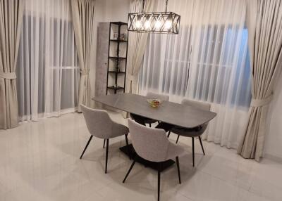 Modern dining room with a table and chairs