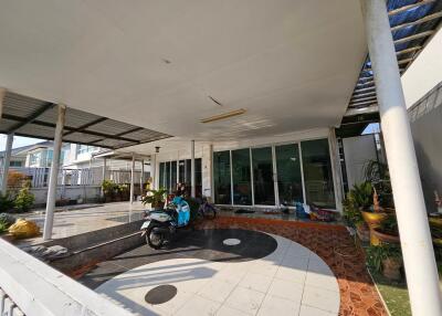 Covered outdoor area with glass sliding doors