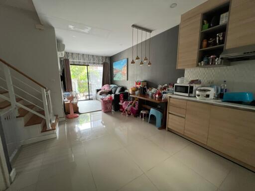 Modern living area with kitchen and dining space