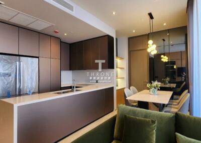 Modern kitchen with dining area and living space