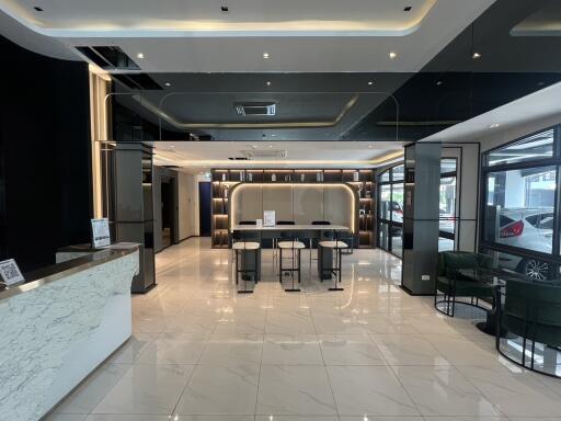 Modern lobby with reception desk and seating area