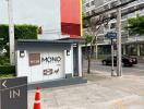 Entrance to Niche Mono Sukhumvit bearing sign and entrance gate