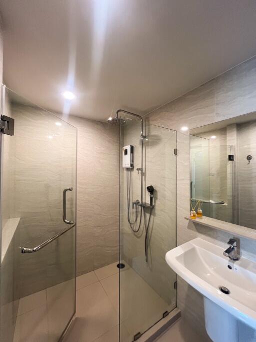 modern bathroom with glass shower and sink