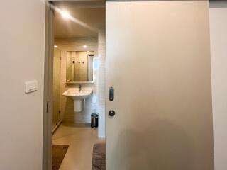 Modern bathroom with sliding door and sink