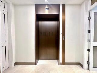 Modern elevator in building lobby