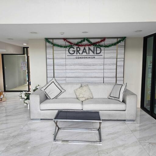 Lobby of Grand Condominium with sofa and decoration
