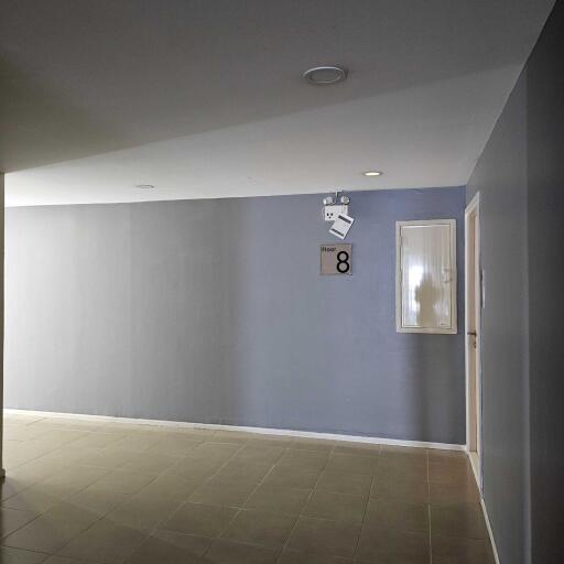 Hallway showing floor sign