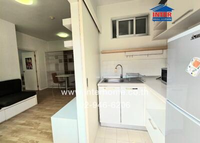 Modern kitchen with an adjoining living area