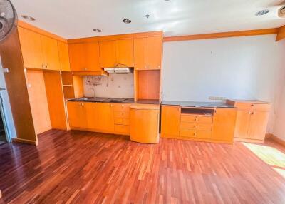 Wooden cabinets kitchen with wooden floor