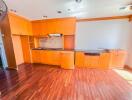 Wooden cabinets kitchen with wooden floor