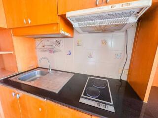 Modern kitchen with stovetop and sink