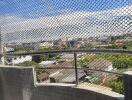 Photograph of a balcony with a view of the surrounding area