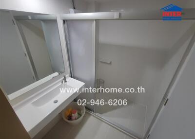 Bathroom with sink and shower