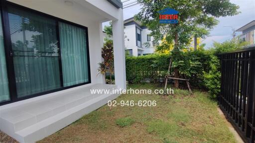 Front yard and exterior view of a house