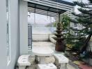 Outdoor patio area with table and benches