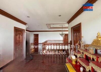 Spacious hallway with wooden accents and traditional decor
