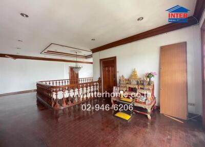 Spacious upper floor landing with wood finishing