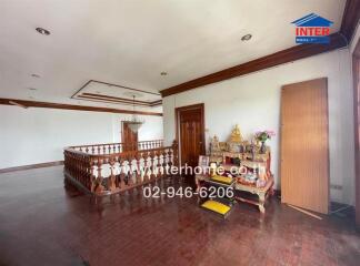 Spacious upper floor landing with wood finishing