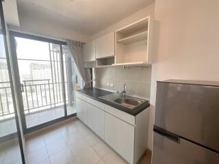 Modern kitchen with balcony access