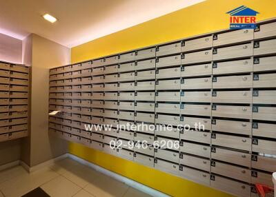 Mailroom with multiple mailboxes in a residential building