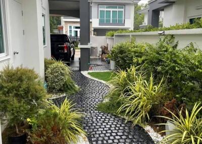 beautifully landscaped garden with a stone pathway
