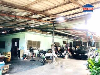 Garage with various items and vehicles