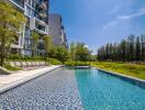 Modern residential building with an outdoor swimming pool