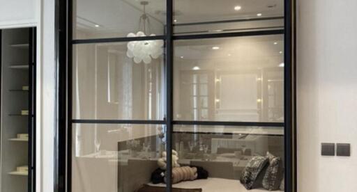 Modern bedroom with glass partition