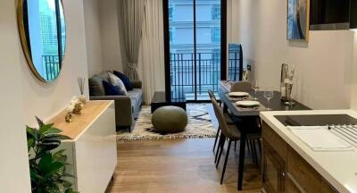 Modern living and dining area with balcony view