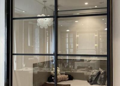 Bedroom with glass partition and modern design