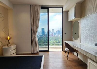 Bedroom with a view of the city