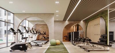 Modern gym with various exercise equipment and large windows.