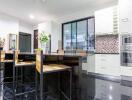 Modern kitchen with sleek design and island seating