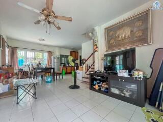 Spacious main living area with dining space and entertainment setup