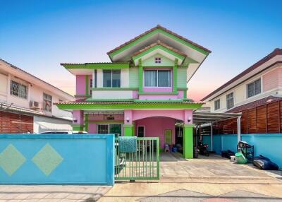 Two-story house with colorful exterior