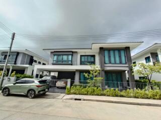 Modern two-story house with garage and driveway