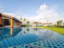 Modern outdoor swimming pool with landscaping