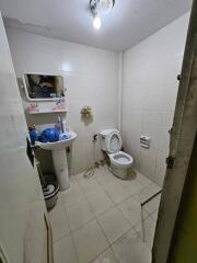 A small bathroom with basic amenities