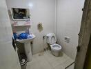 A small bathroom with basic amenities