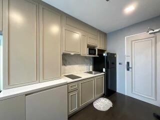 Modern kitchen with built-in appliances and elegant cabinetry