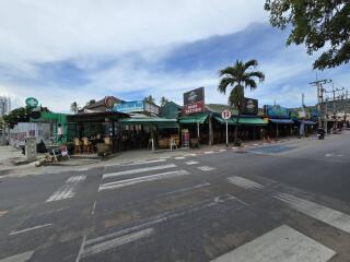 Street view of commercial area with various businesses