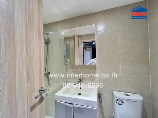 Modern bathroom with vanity and toilet