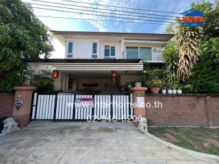 Front view of a residential house with garage