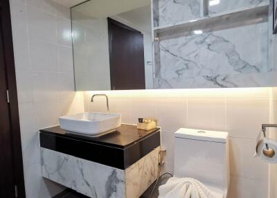 Modern bathroom with marble accents